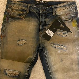 Valabasas distressed paint denim jeans